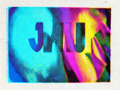 Screenprinted text in process color with slight misregistration, colored halos a