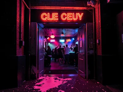 Club entrance with neon spill