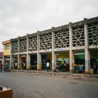 Overcast flat light in Accra, Ghana turning surfaces into pure color fields, Mak
