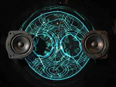 Water showing interference pattern between two speaker sources