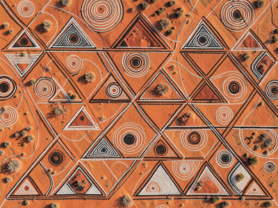 Aboriginal Australian dot painting aesthetic,. A wide Western Desert Aboriginal dot painting inspired geometric composit