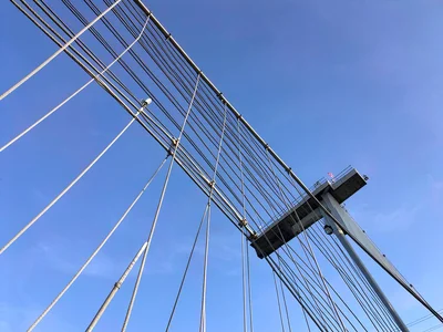 Bridge cables against sky