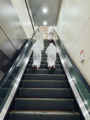 Escalator ghost figures