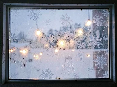 Outside lights visible through frost pattern