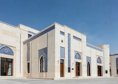 Extreme minimalist restraint of Muscat, Oman, royal opera house exterior, cream 