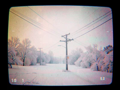 Freezing fog coating power lines in thick rime ice, winter landscape