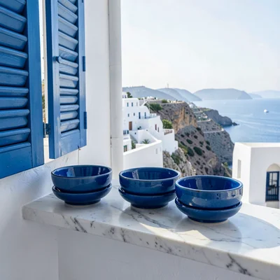 Sidi Bou Said cobalt-white, cliff-top absolute palette, Blue ceramic bowls stack