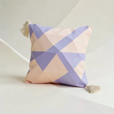 Soft peach lowpoly throw pillow with chunky lavender stripe facets and a cream t