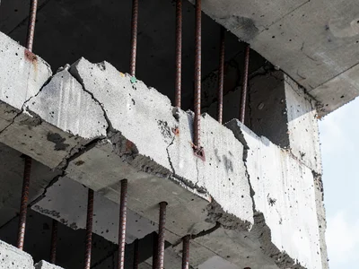 Rebar visible in broken concrete
