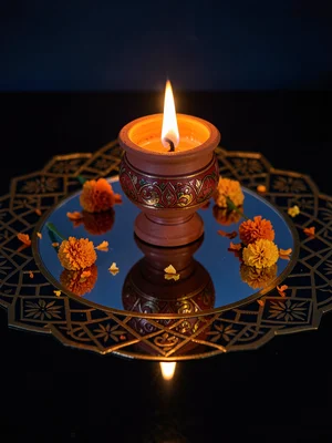 Decorated Diya on Mirror Tile with Marigold