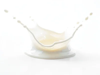 Milk splash on white surface
