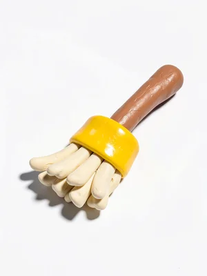 Hardworking chunky clay broom in primary yellow with stubby cream-toned bristles