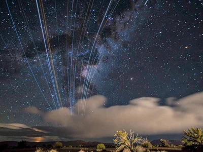 Trails through thin cloud creating glow