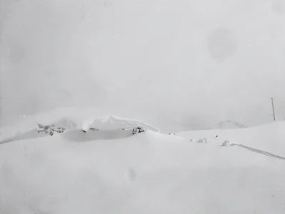 Wind drift edge creating subtle shadow