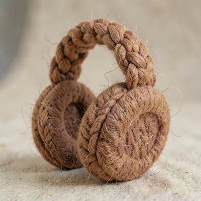 Lobed faded-rust knit earmuffs with thick mohair pads and a chunky-knit headband