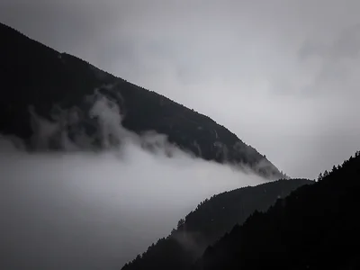 Single ridge silhouette against gray gradient