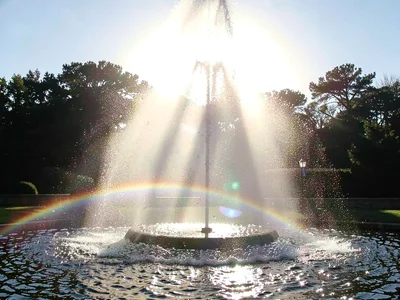 Fountain spray backlit rainbow visible