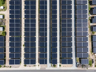 Solar panel farm, black rectangles with geometric precision