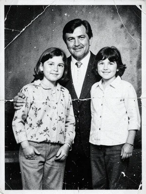 Xerox of family photograph with father, generations of copy degradation