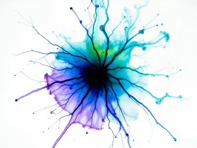 Alcohol ink dropped on wet yupo paper, intense color spreading organically with 
