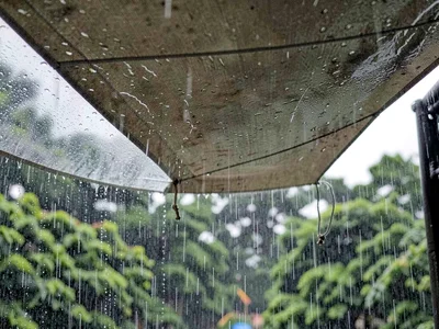 Rain drumming on canvas awning
