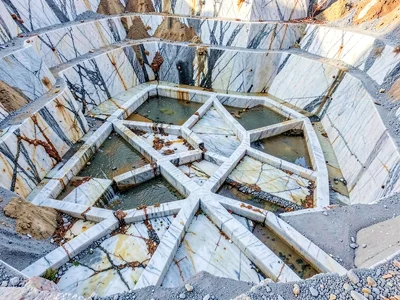 Rain water channels cutting patterns in quarry floor