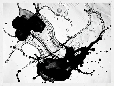 Agitated water creating chaotic ink patterns