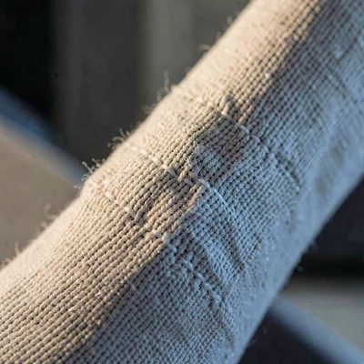 Mineral macro of a stocking heel reinforcement, fine knit transition revealed un