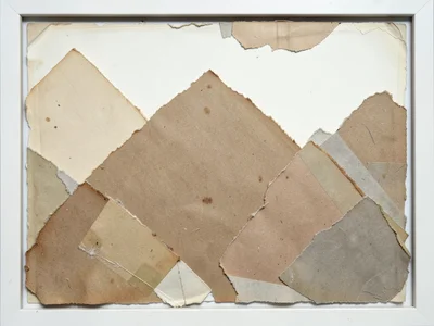 Brown kraft paper torn into mountain silhouette shapes, layered near-to-far crea