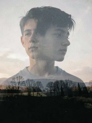 Teenager doubled with static, the noise of becoming