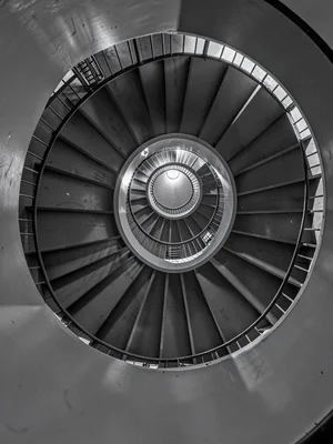 Stairwell spiraling with exaggerated perspective