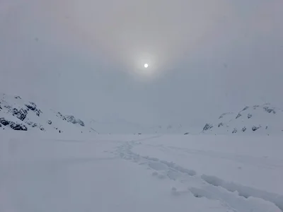 Moon rise over all white landscape