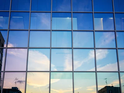 Glass panels showing sky at different times as pattern