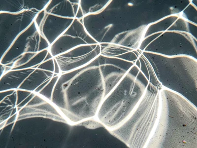 Sand ripples with caustic overlay