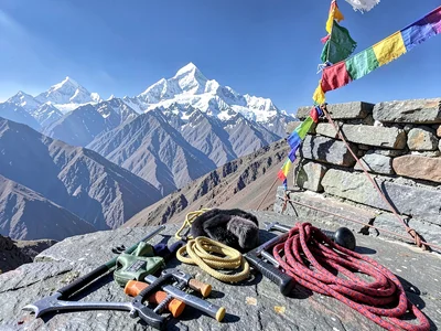 Sherpa climbing gear on stone