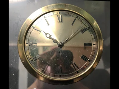 Brass clock face detailed
