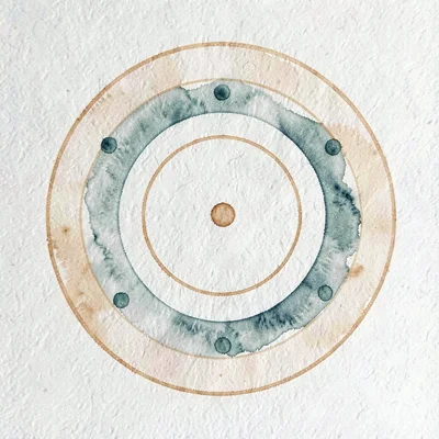 Schematic of three concentric rings with small dot markers in dusty teal and och
