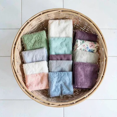 Top-down catalog of a quilter's basket organized by color