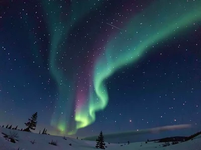 Faint aurora against deep star field