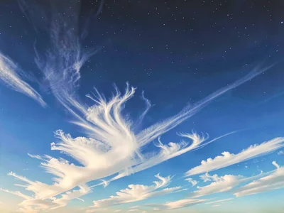 Cirrus clouds catching light in the mesosphere zone of visible color