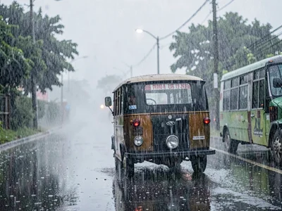 Auto rickshaw in heavy rain