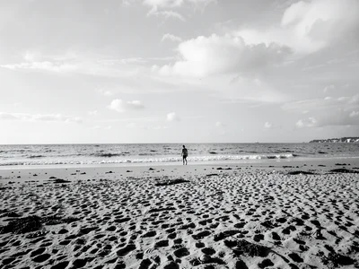 Person on beach from far