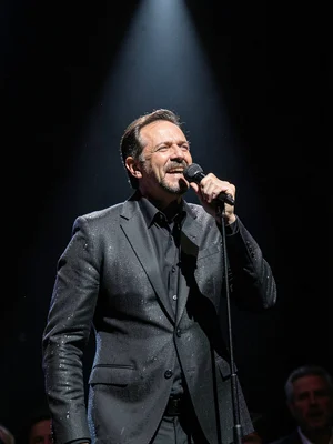 Singer at microphone spotlight