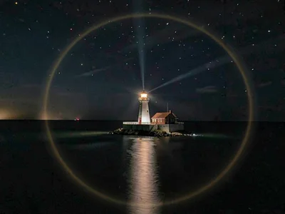 Lighthouse at night, fifteen minutes of rotating beam creating complete circle