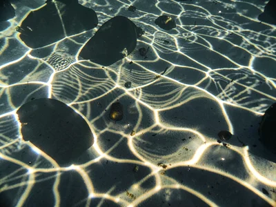 Shadow and light interference creating moire underwater