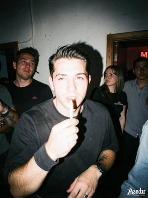 Cigarette break outside a venue