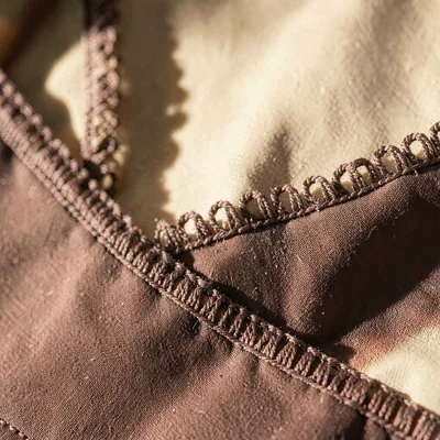Helmar-mineralcut close-up of picot edge on a longline bra, fine looped trim und