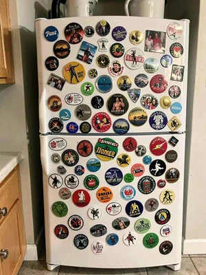 Fridge covered in magnets