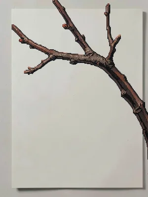 The bare twig of a winter plum branch arched against an empty paper screen lit b