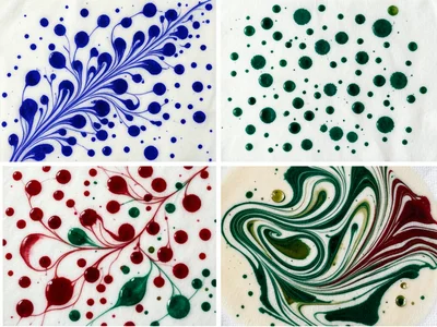 Traditional battal ebru marbling, scattered drops of lapis blue, cinnabar red, a